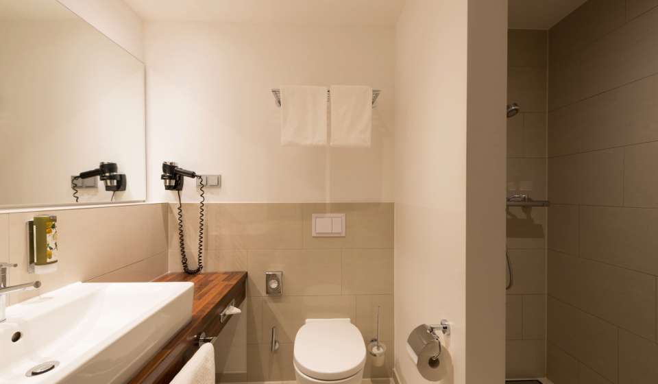 Badezimmer im Heikotel Hotel am Stadtpark