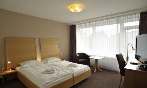 Wohnbereich im Doppelzimmer Standard im Heikotel City Nord