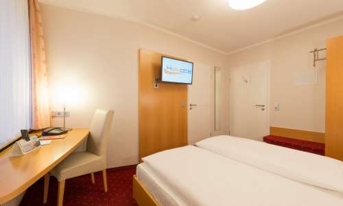 Blick auf den Wohnbereich im Doppelzimmer Standard im Heikotel Hotel Windsor